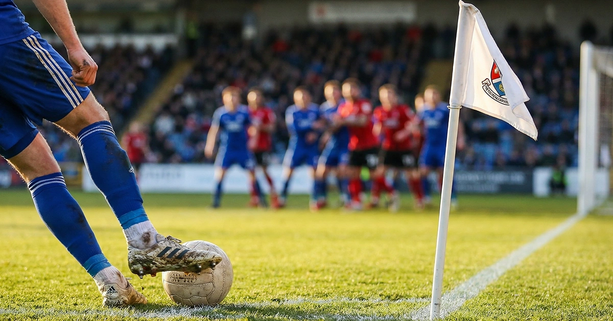 Bundesliga Ecken Wetten – Spieler stellt den Ball an der Eckfahne bereit